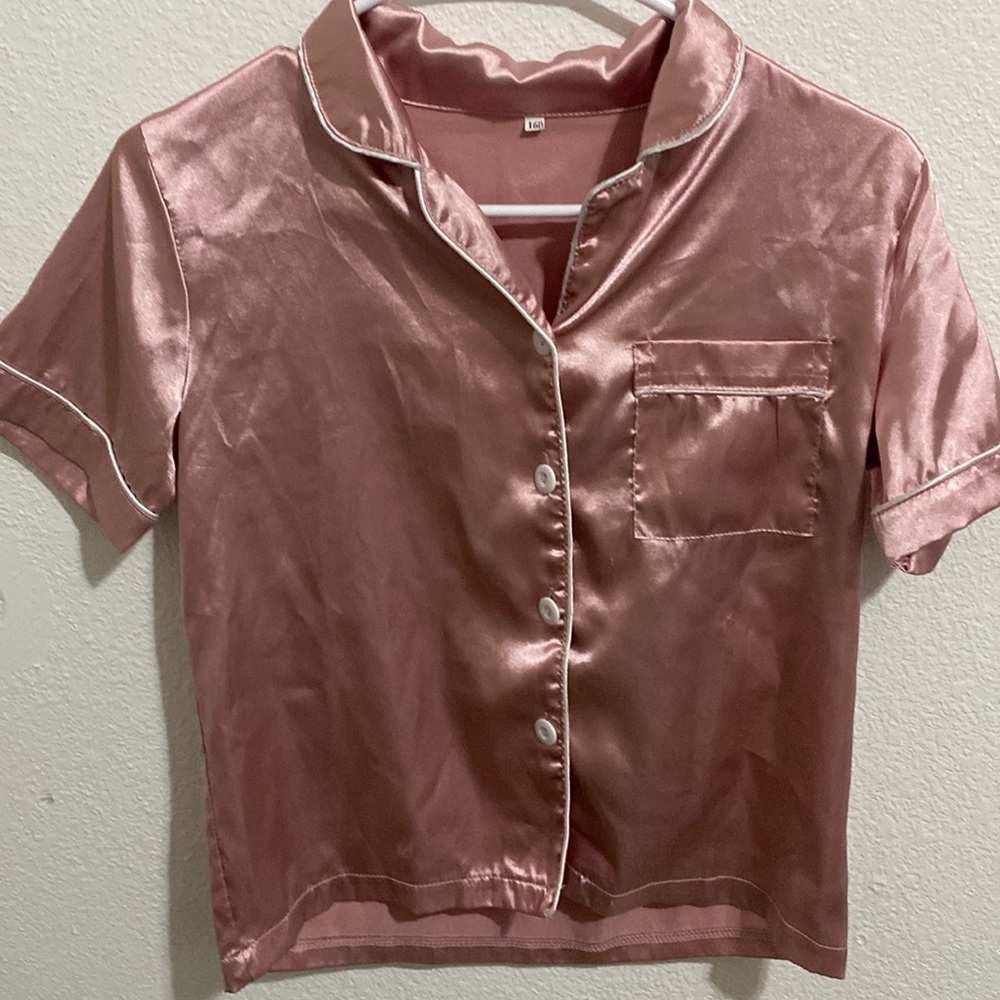 A pink pj shirt only wore twice